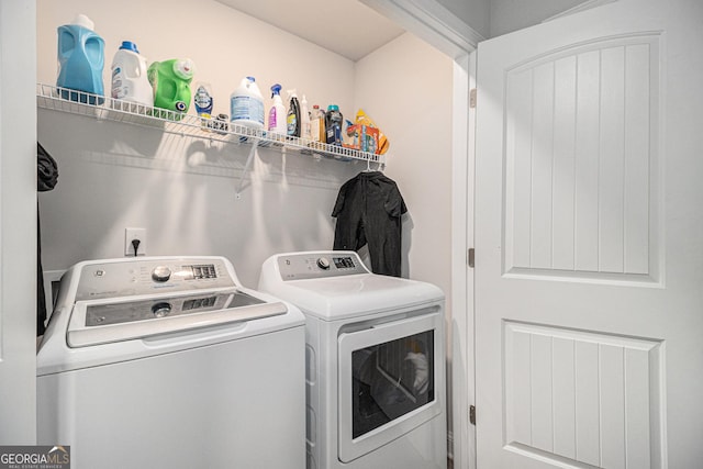 clothes washing area with independent washer and dryer