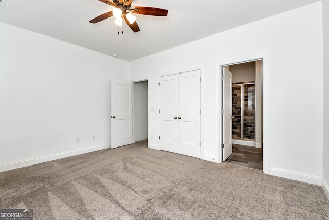 unfurnished bedroom with carpet flooring, connected bathroom, and ceiling fan