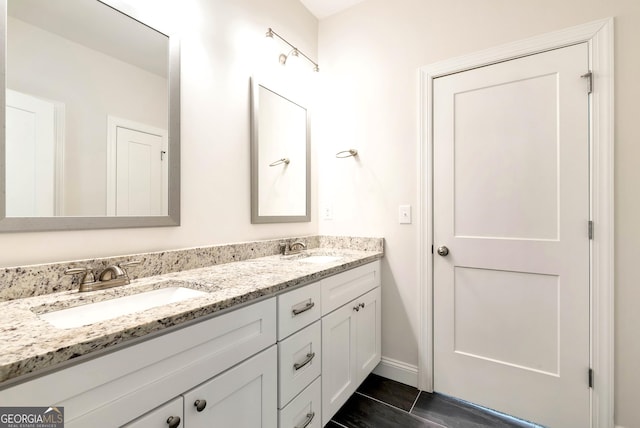 bathroom featuring vanity and tile patterned floors
