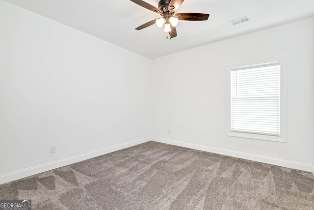 unfurnished room with carpet flooring and ceiling fan