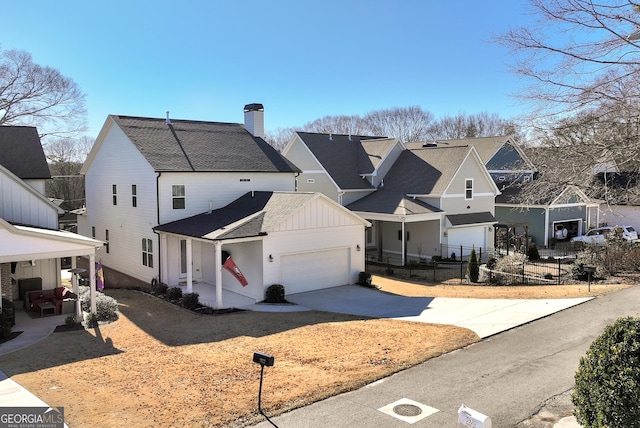 view of front of property with a garage