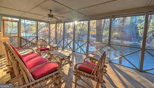 sunroom / solarium with ceiling fan