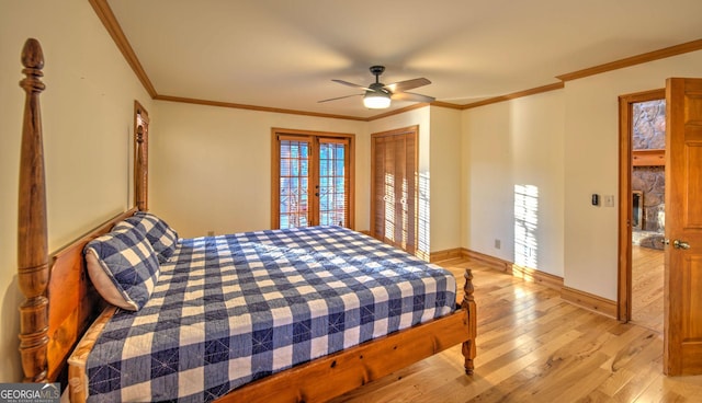 bedroom with ceiling fan, light hardwood / wood-style floors, ornamental molding, and french doors