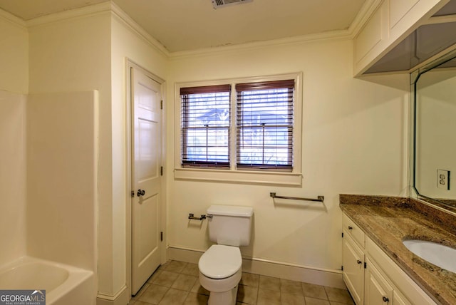 bathroom with toilet, vanity, tile patterned floors, and crown molding