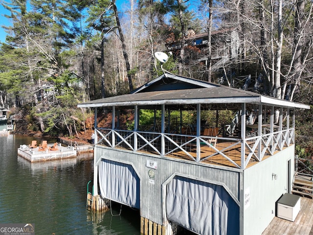 view of dock with a water view