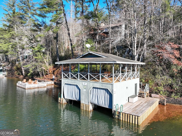 dock area featuring a water view