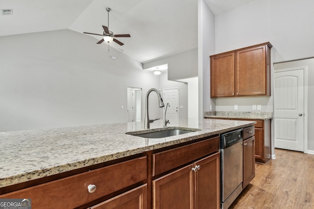 kitchen with light stone countertops, ceiling fan, sink, light hardwood / wood-style flooring, and dishwasher