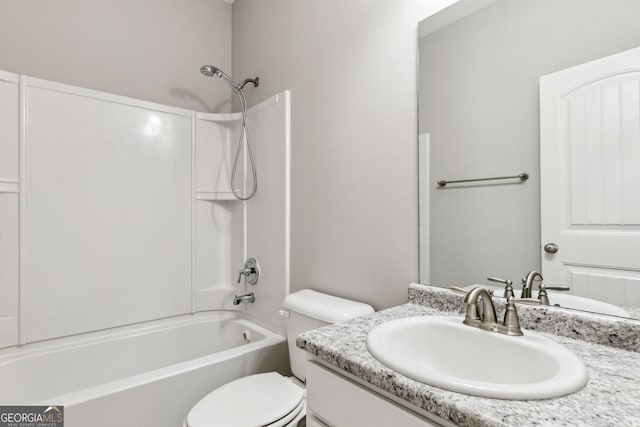 full bathroom with shower / bathing tub combination, vanity, and toilet