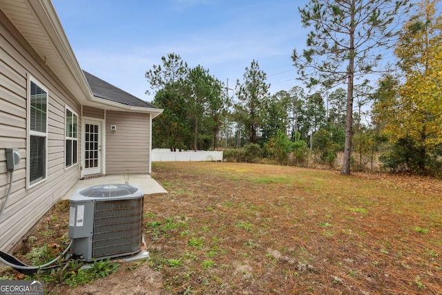 view of yard featuring central AC