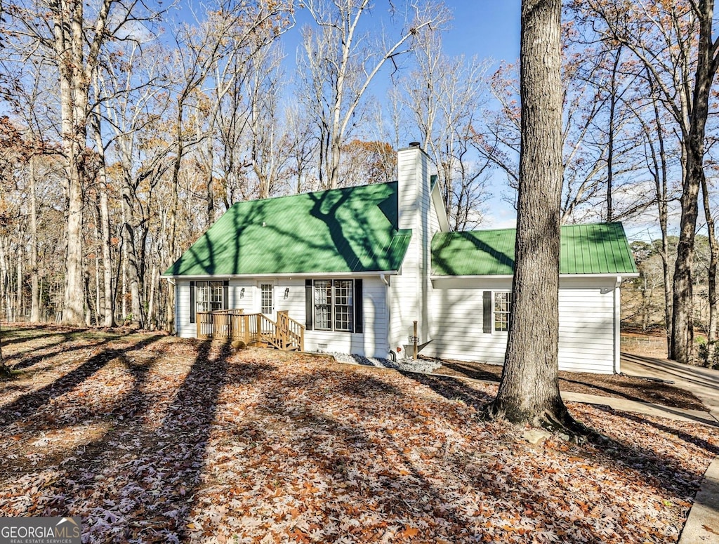 single story home featuring a garage