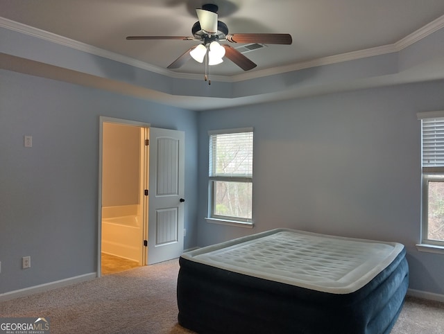 bedroom with light carpet, connected bathroom, ceiling fan, and ornamental molding