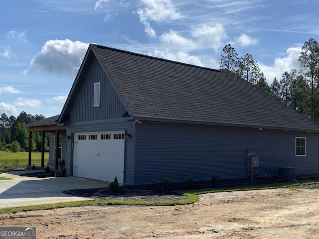 1950 Payne Rd, Rentz, GA 31075 - view of property exterior with concrete driveway, a shingled roof, and a garage