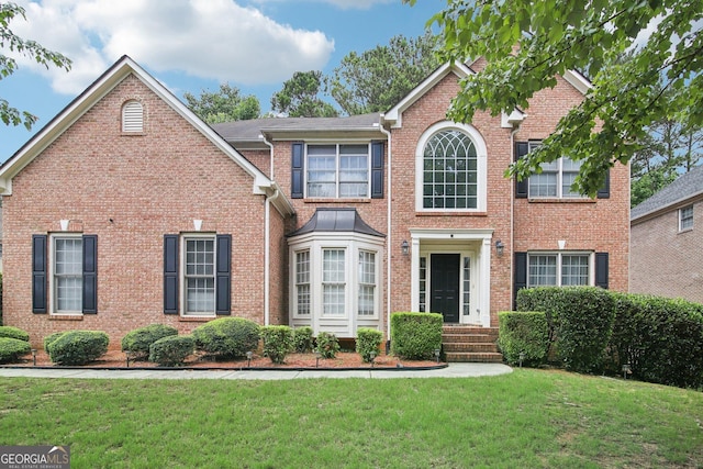 view of front facade with a front lawn