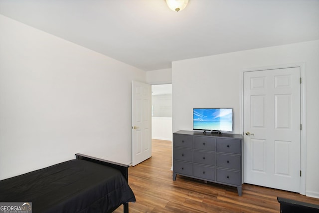 bedroom featuring hardwood / wood-style floors