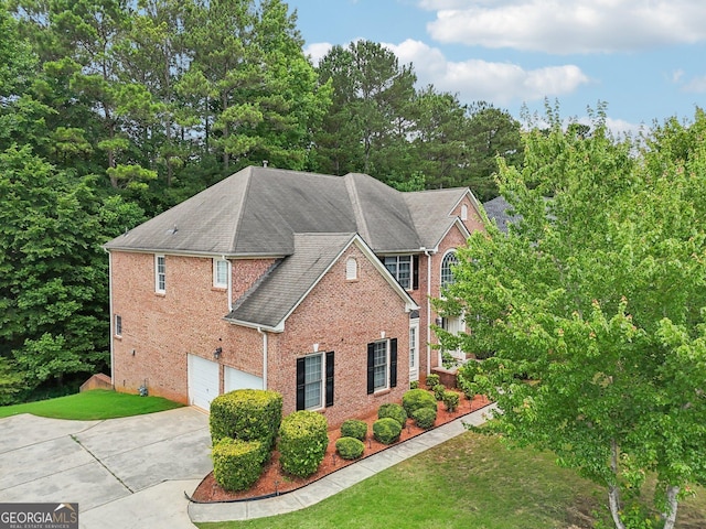 view of property exterior featuring a yard and a garage