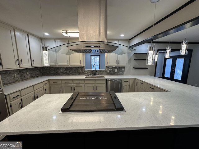 kitchen featuring kitchen peninsula, black electric stovetop, sink, pendant lighting, and dishwasher