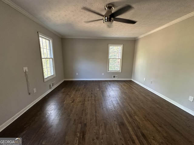 unfurnished room with crown molding, dark hardwood / wood-style flooring, ceiling fan, and a textured ceiling