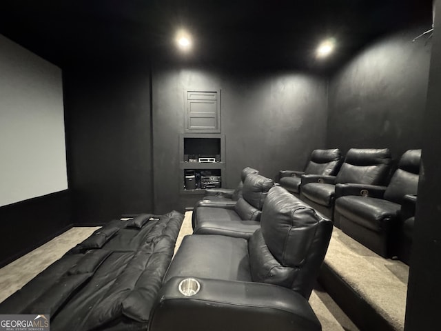 home theater room with carpet flooring