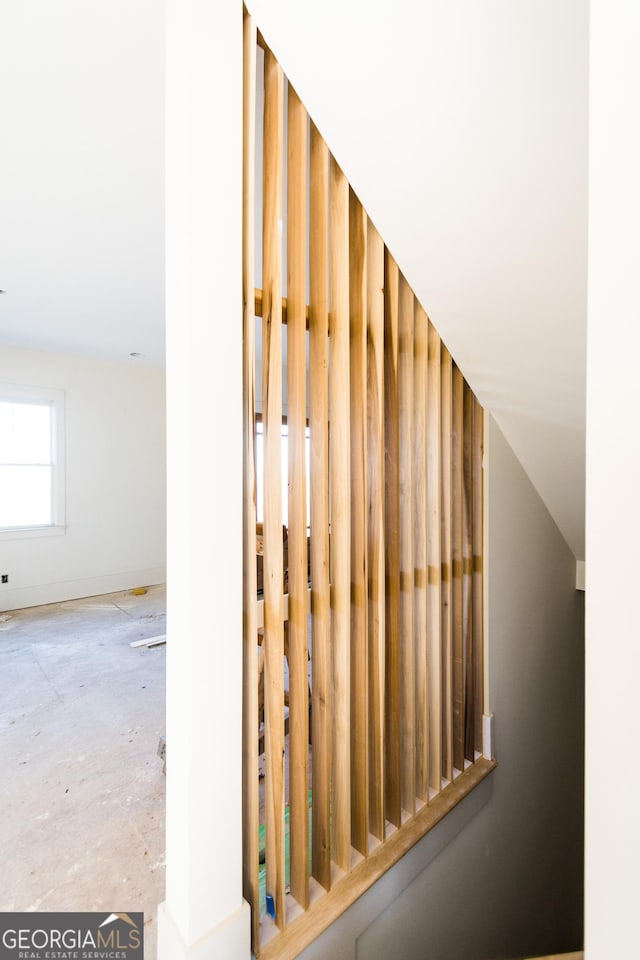 stairs with lofted ceiling