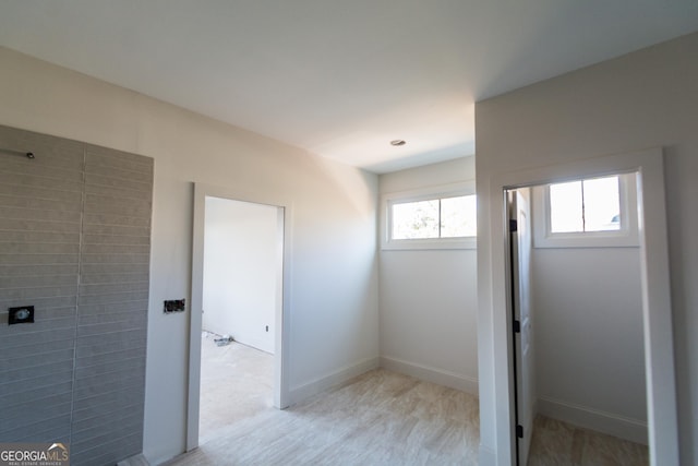 bathroom with wood-type flooring