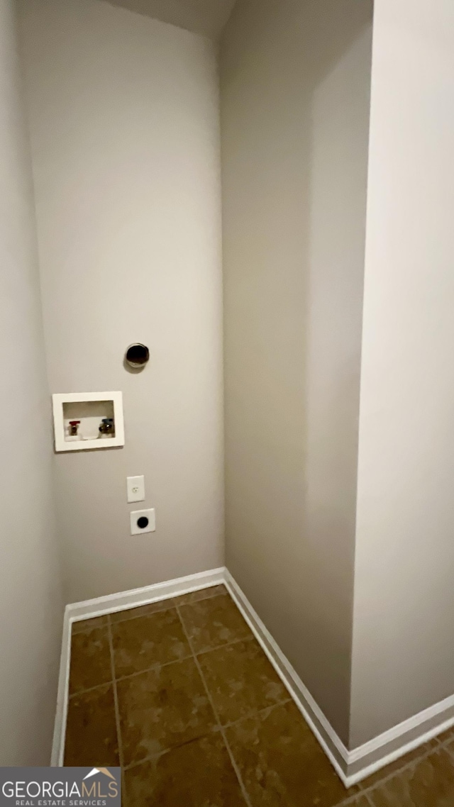 clothes washing area featuring hookup for an electric dryer and hookup for a washing machine