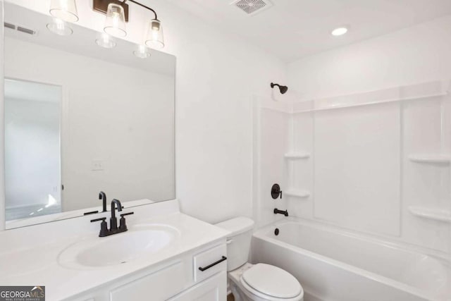 full bathroom with vanity, toilet, and shower / tub combination