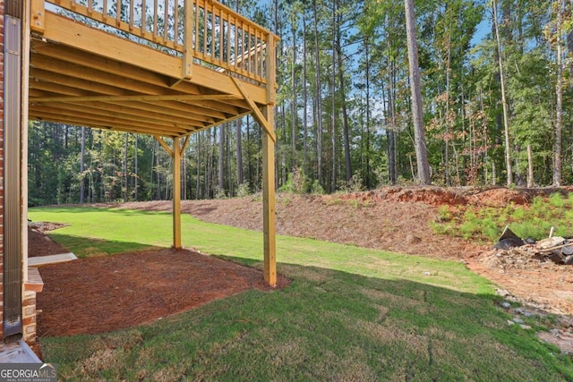 view of yard with a deck