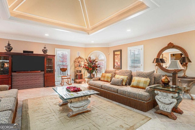 tiled living room with plenty of natural light, a premium fireplace, and crown molding