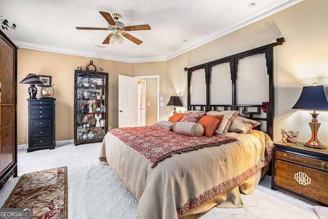 bedroom featuring ceiling fan, carpet floors, crown molding, and multiple windows