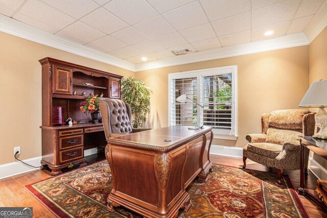 bathroom featuring vanity, an enclosed shower, and ornamental molding