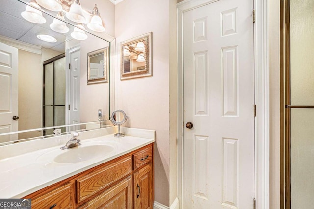 spacious closet featuring a paneled ceiling and hardwood / wood-style flooring