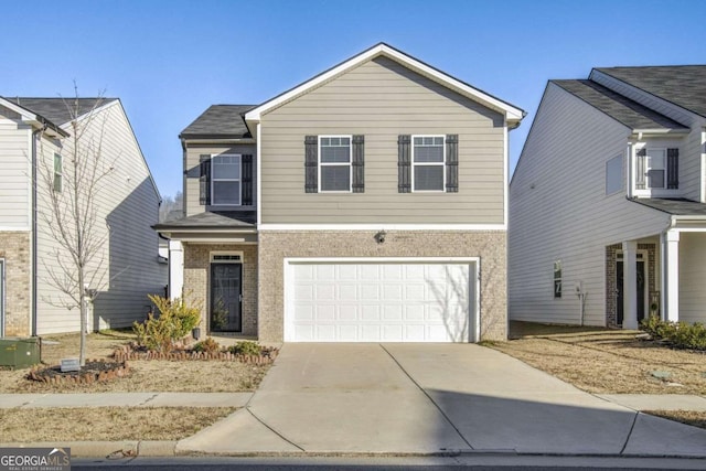 view of front of property with a garage