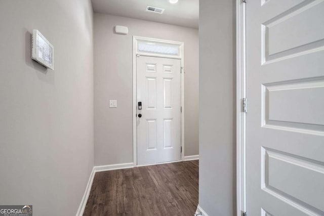 entryway featuring dark wood-type flooring