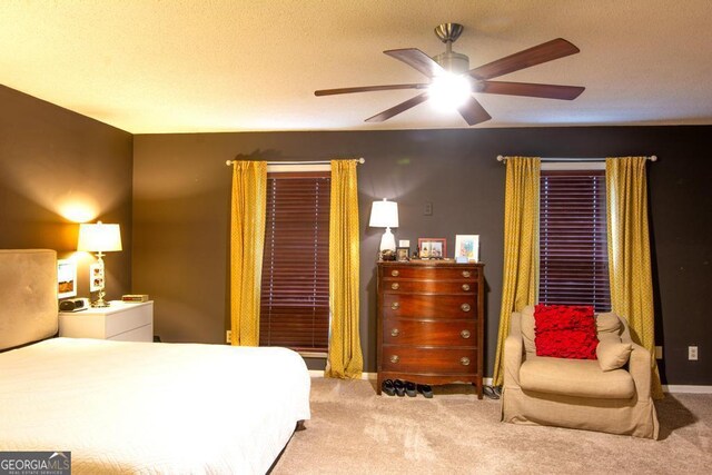 bathroom with a washtub, vanity, and a textured ceiling