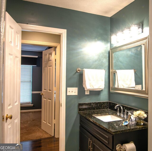 bathroom with tile patterned floors, a textured ceiling, and toilet