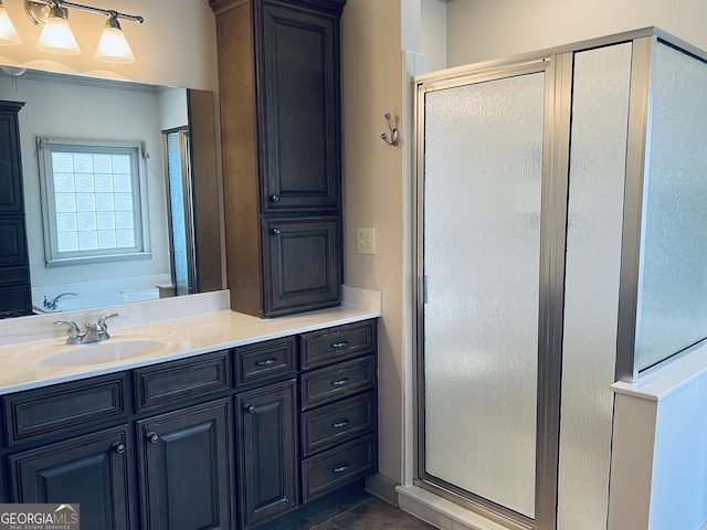 bathroom with shower with separate bathtub, vanity, and tile patterned floors