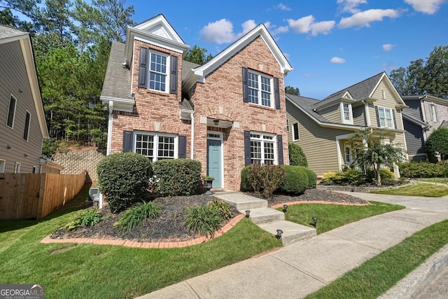 view of front of home with a front yard