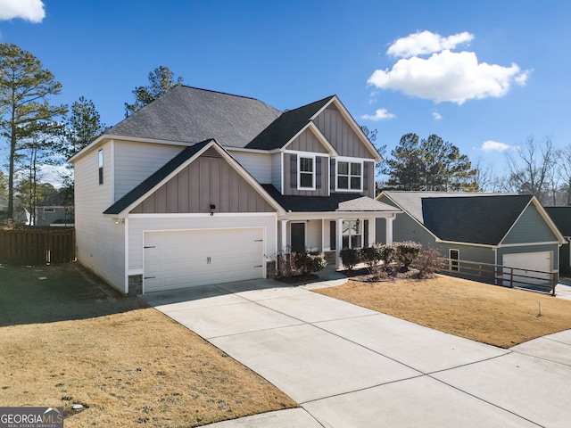 view of front of house featuring a garage and a front yard