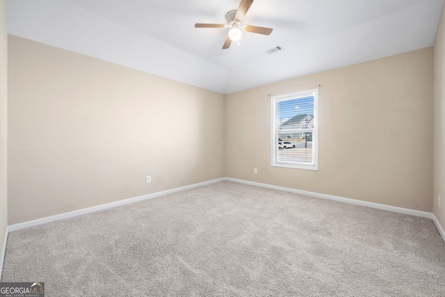 unfurnished room featuring ceiling fan and carpet flooring