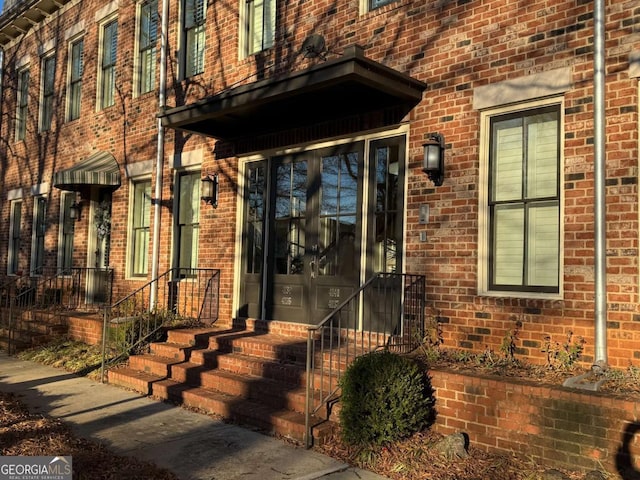 view of exterior entry featuring french doors