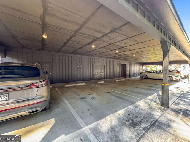 garage featuring a carport