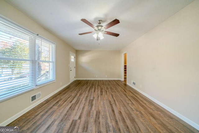 unfurnished room featuring hardwood / wood-style flooring and ceiling fan