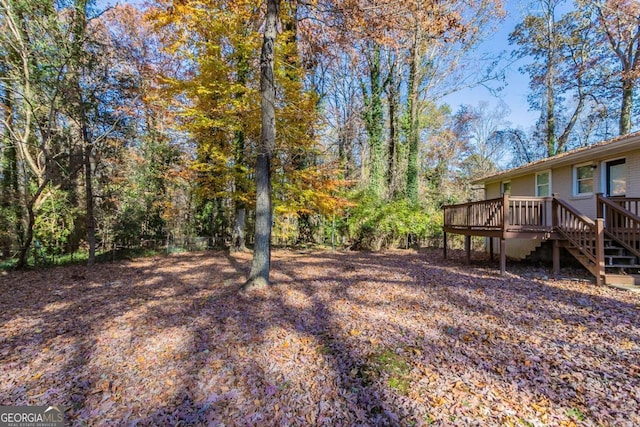 view of yard with a deck