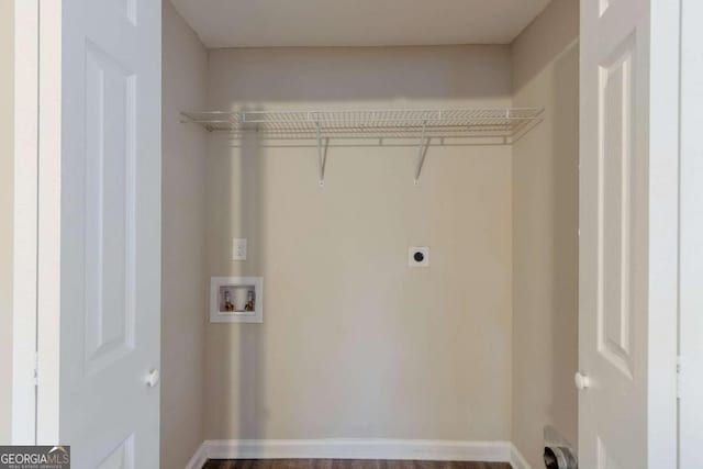 washroom featuring hookup for an electric dryer, hardwood / wood-style flooring, and hookup for a washing machine