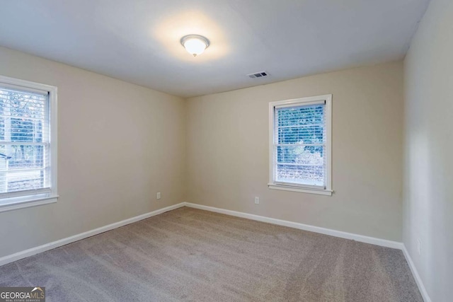 view of carpeted spare room