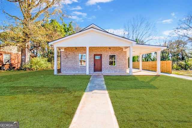 view of front of house with a front lawn and a porch