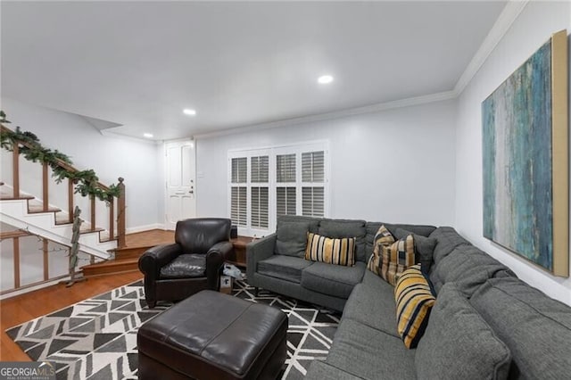 living room featuring crown molding and wood-type flooring