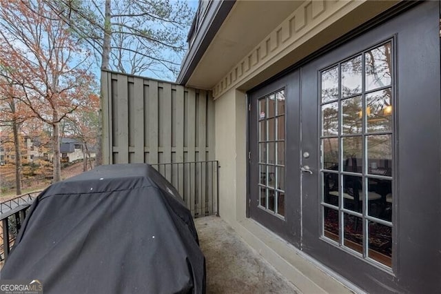 view of side of home with french doors