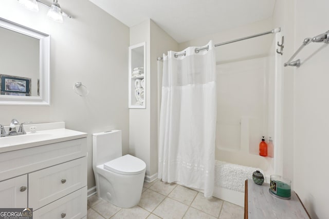 full bathroom featuring tile patterned flooring, vanity, toilet, and shower / bath combo with shower curtain