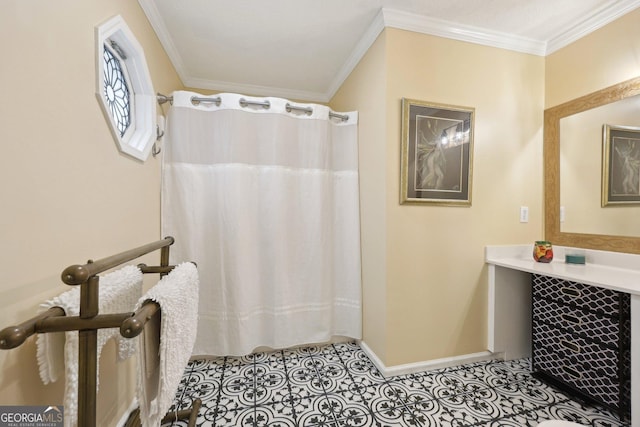 bathroom with tile patterned floors, vanity, and ornamental molding